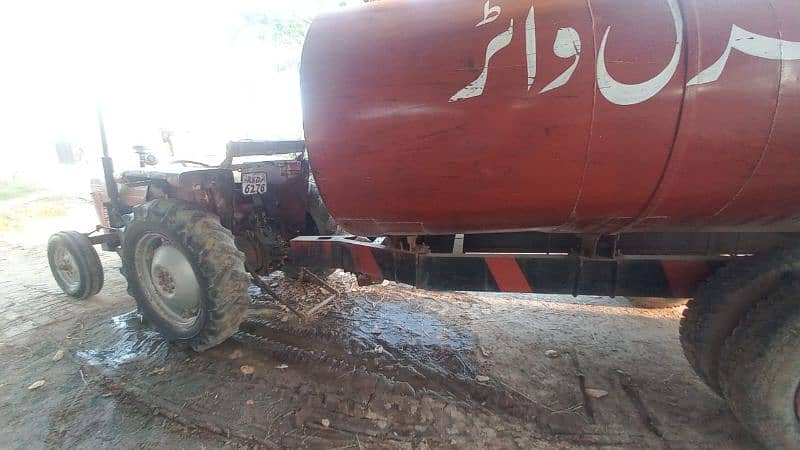 mf240 tractor and water tank 11