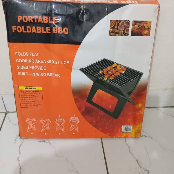 Portable and Foldable BBQ Stand with Grill in New Condition 4