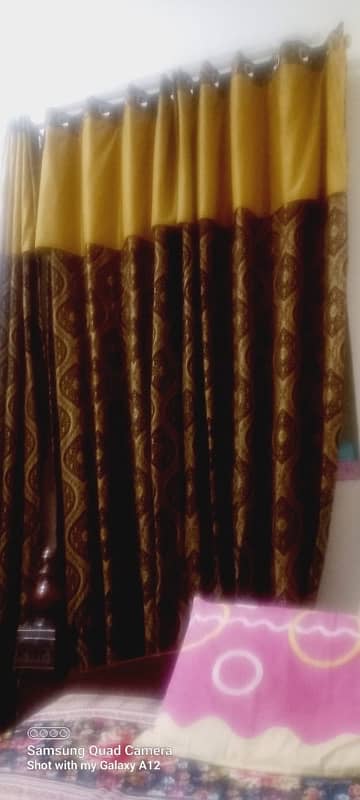 5 curtains 9 ft length  11 inch width call on +92 318 7334814 3