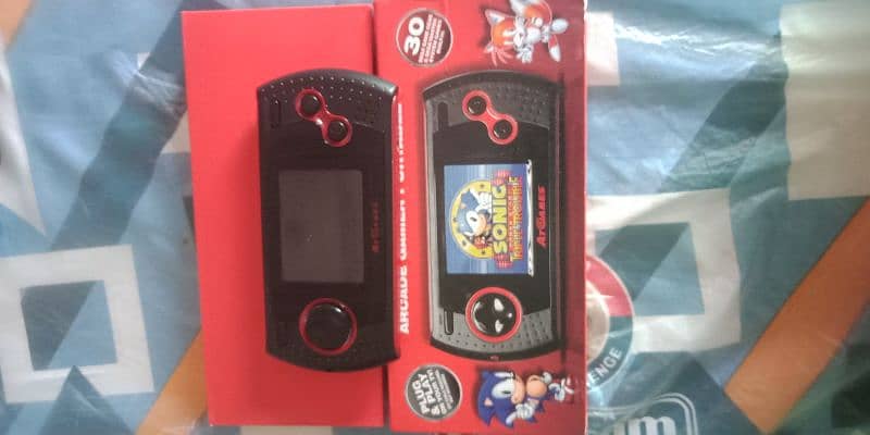 Nintendo switch with Mario kart live car and retro handheld consoles 2