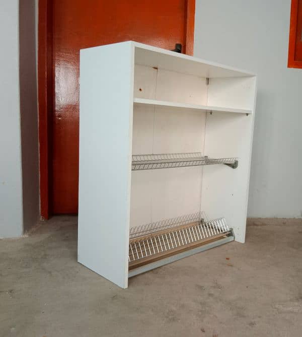 Beautiful white utensils shelf for furnished kitchens 1