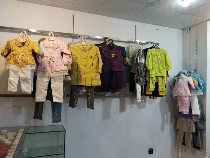 4 shops full boutique with jewelery,clothes and lace button garments 2