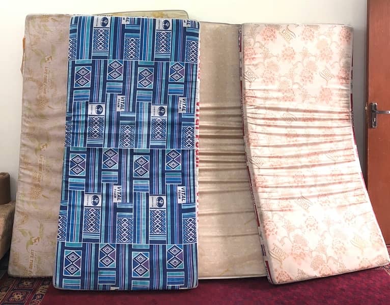 “Cozy Comforts: Gently Used Mattresses & Plush Round Pillows. 2