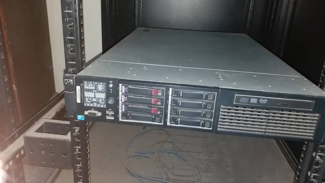 Server Rack, HP server , cisco router and 48 port switch. 4