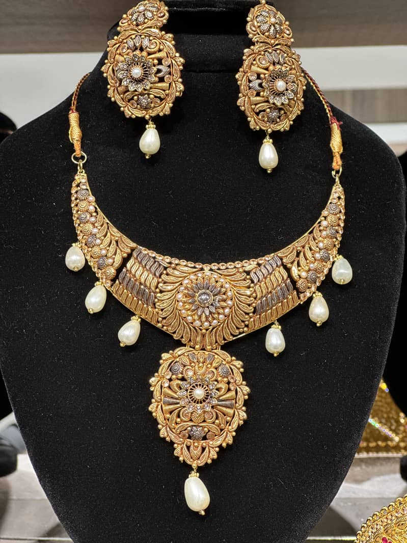 Artificial with 2 karat gold plated 3