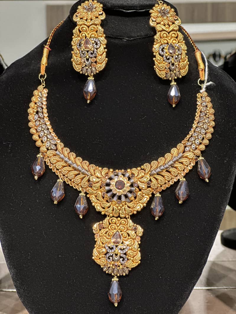 Artificial with 2 karat gold plated 4