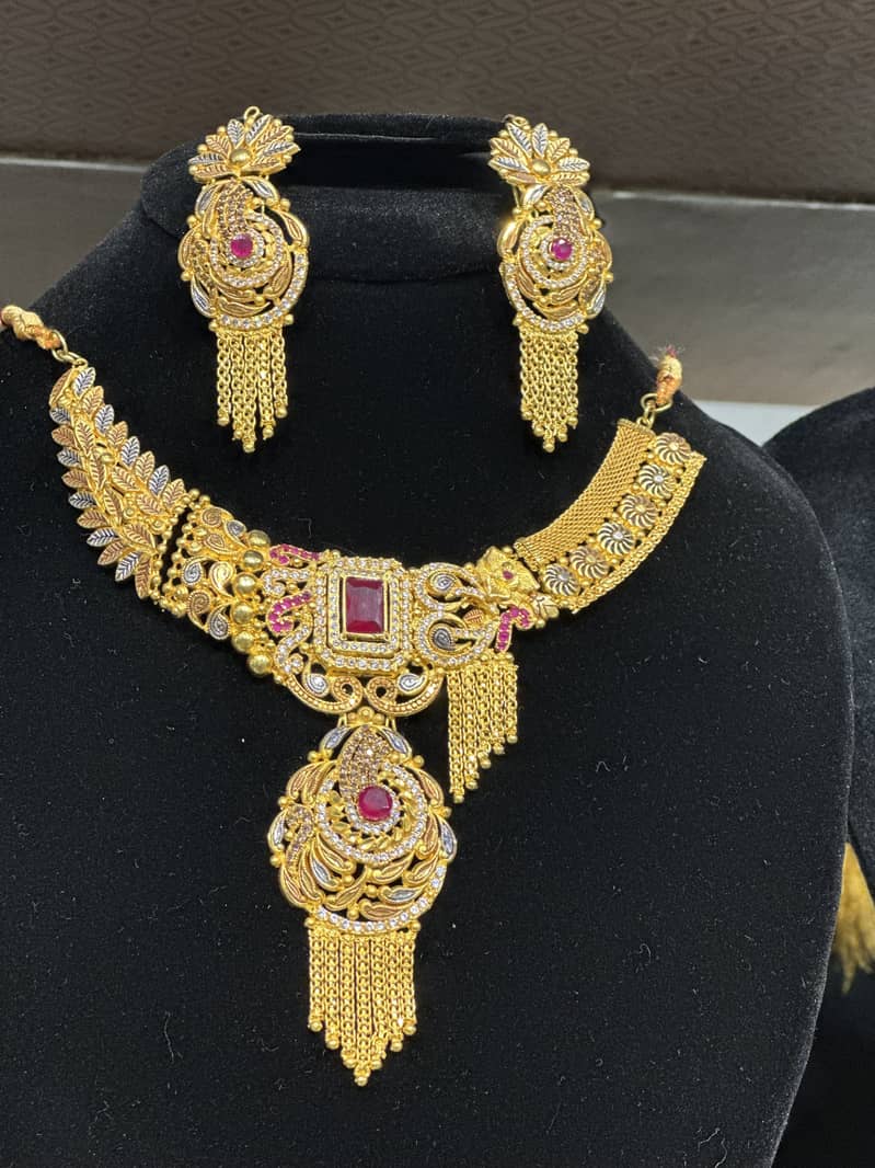 Artificial with 2 karat gold plated 11