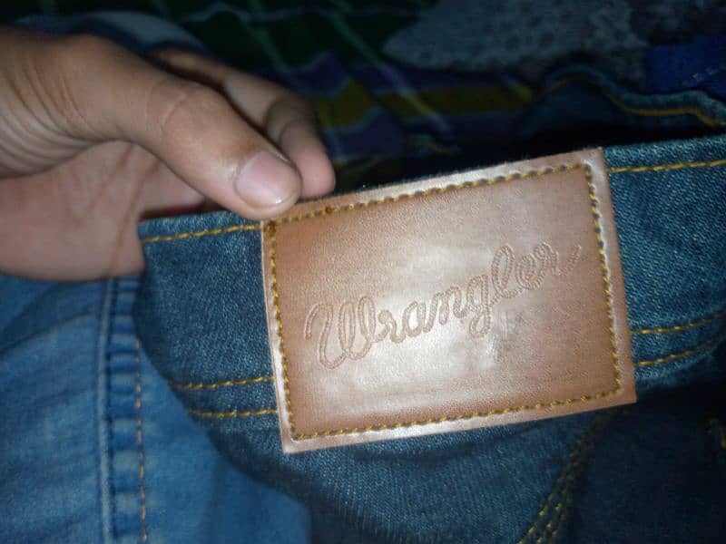 Wrangler brand jeans Blue and Black  west  I think 42 7