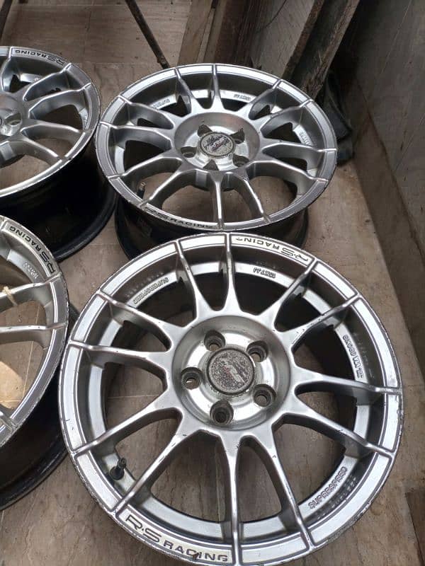 15 inch 7jj alloy rims 5 nuts 2