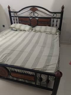 Iron bed with mattress