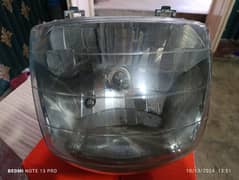 Honda Deluxe 125 head light and vizer