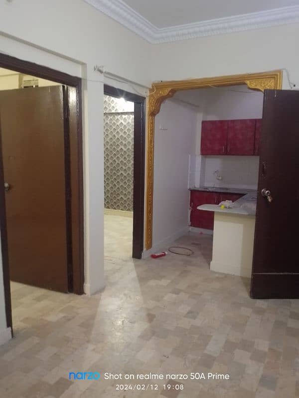 flat for sale 2 bed loun Fariyal Paradise jouhar block 19 40lac leasd 0