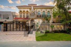 1 KANAL ORIGINAL FAISAL RASOOL SPANISH DESIGN BANGALOW WITH FULL BASEMENT AND FULLY FURNISHED FOR SALE NEAR TO PACKAGES MALL.