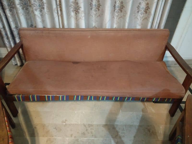 very old sofas in good condition wood is original and all good 4