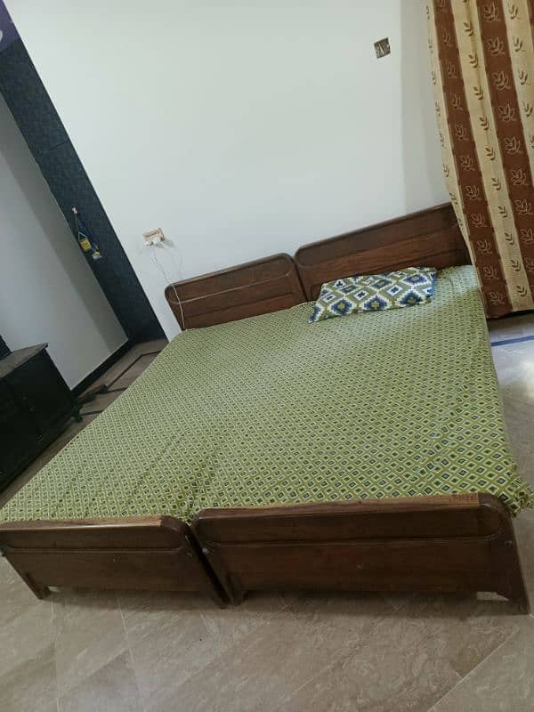 wooden 2 single beds 3