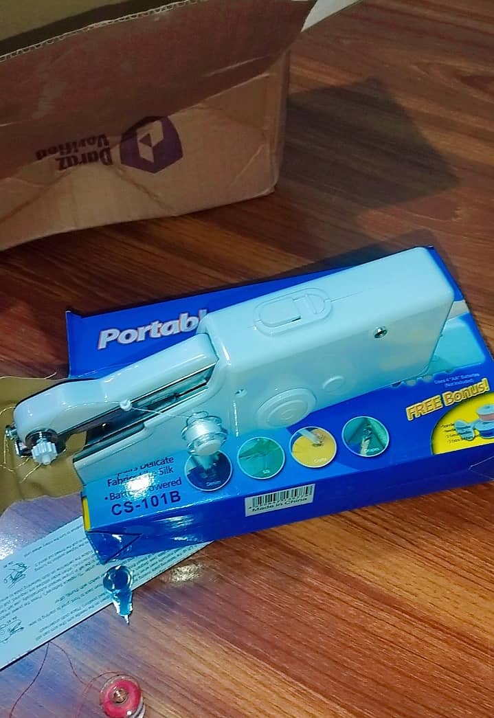 Portable mini sewing machine 0