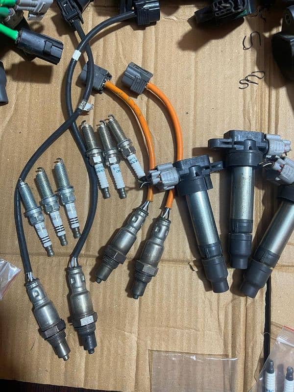 Suzuki new alto oxygen sensor ignition coils irridium plugs 2