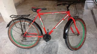 Red and Black Bicycle with Strong Body.