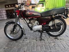 sahiwal number Honda 125 Red colour 0