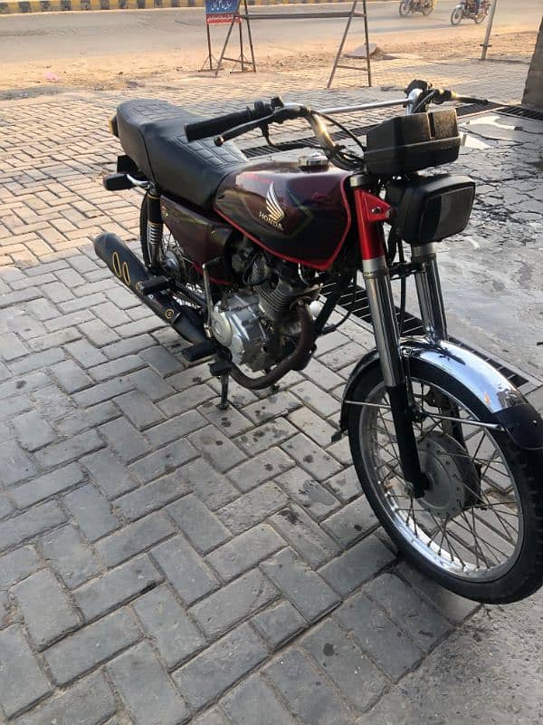 sahiwal number Honda 125 Red colour 1