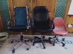 Office table and three office chairs collectively for sale