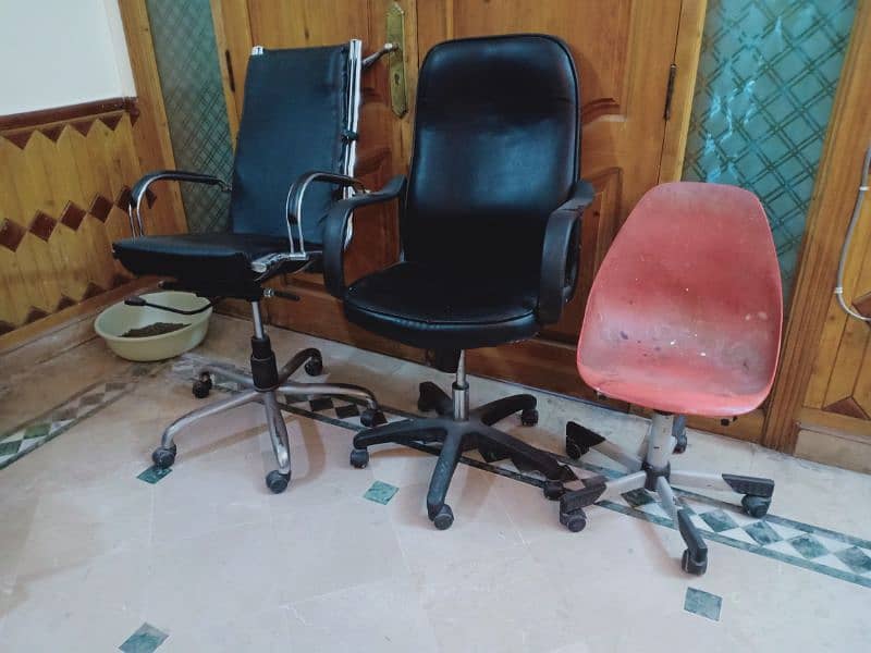 Office table and three office chairs collectively for sale 1