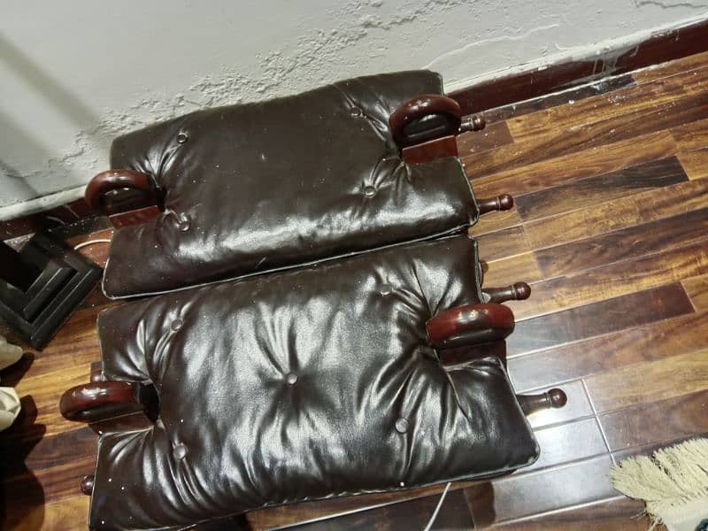 2 wooden and leathers seater 1