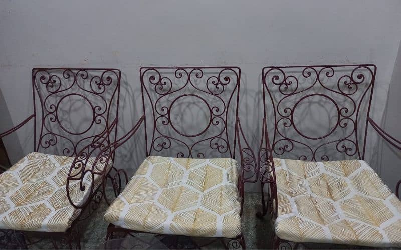 5 chairs and 1 round table with glass top 6