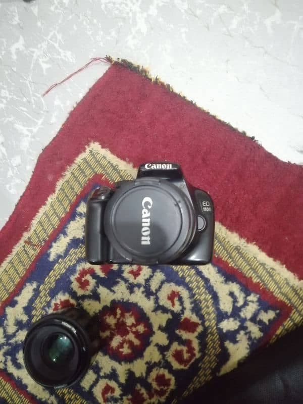 Canon 1100d tripod and led light 4