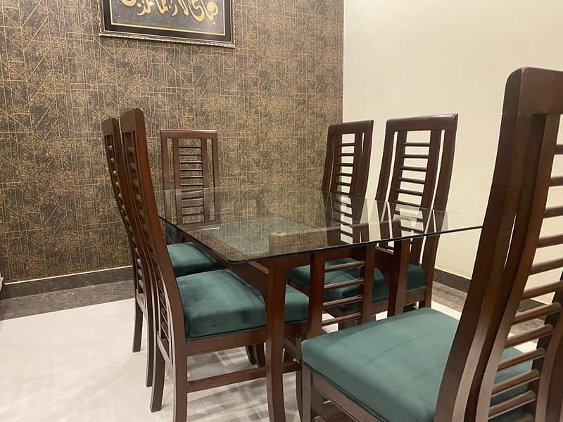 wooden dinning table 6 seater with moltyfoam seats 0