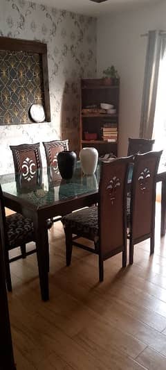 Glass dinning table with 6 chairs