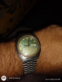 omax automatic watch