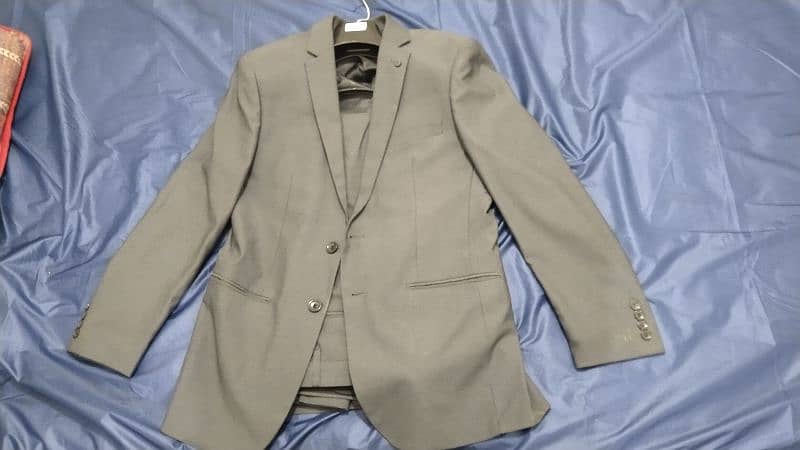 brand new pant coat and tie etc  of charcoal  " only one time used 1