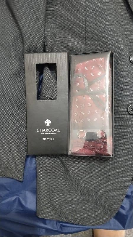 brand new pant coat and tie etc  of charcoal  " only one time used 3