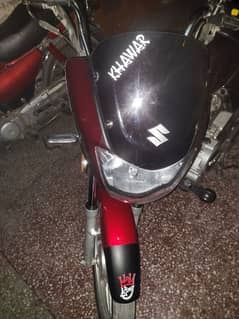 Suzuki 110s red