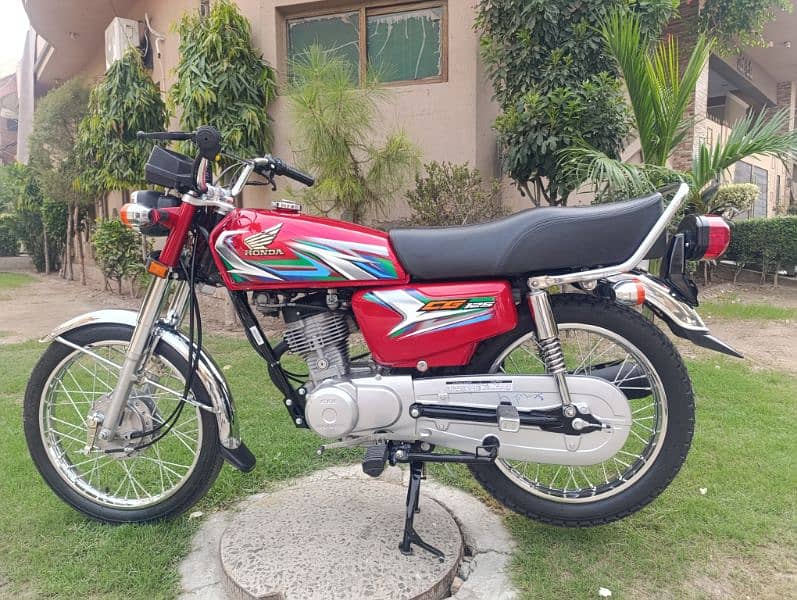 Honda 125 red colours 0