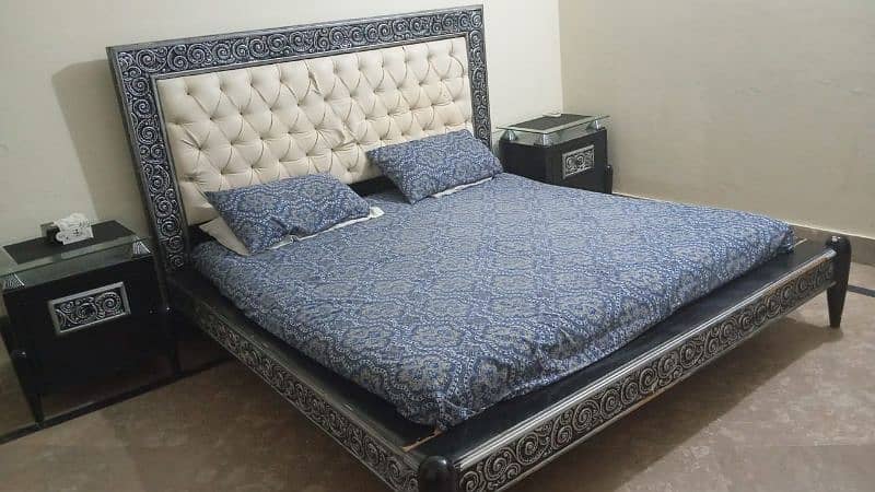 Double Bed King size. Side Tables with glass tops 1