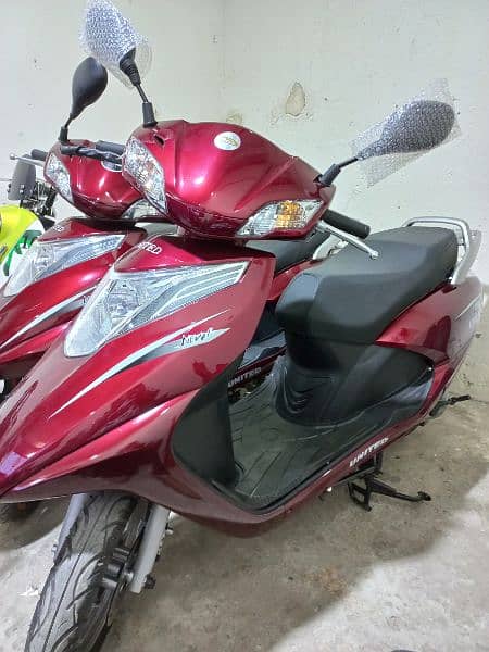 united 100cc scooty available contact at mobile# 03004142432 5