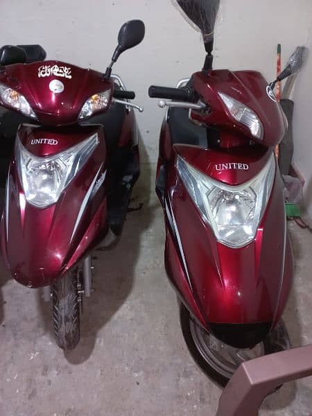 united 100cc scooty available contact at mobile# 03004142432 12