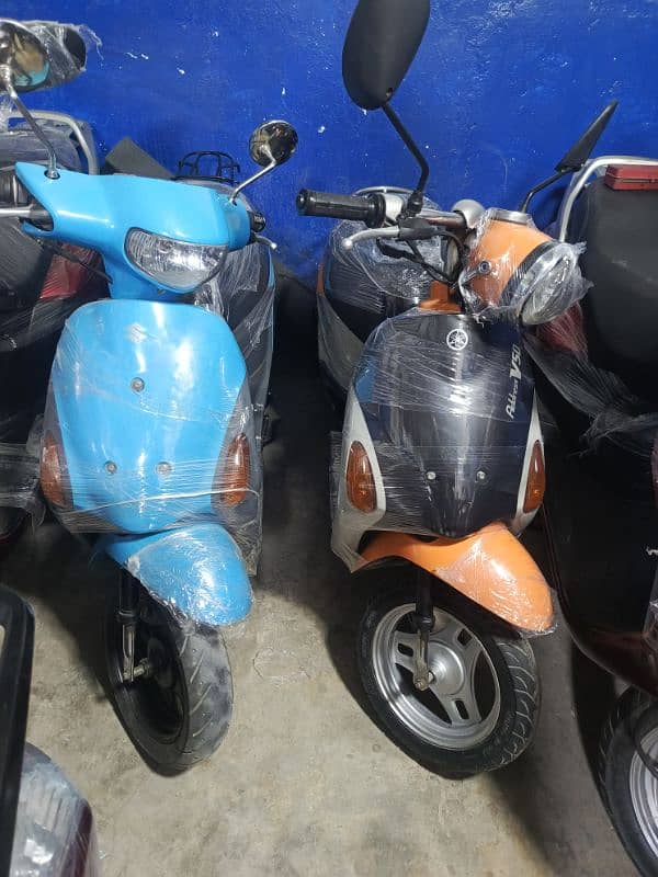 united scooty and 49cc scooty available contact at 0300 4142432 11