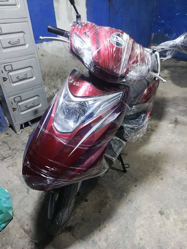 united scooty and 49cc scooty available contact at 0300 4142432 14