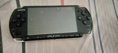 Sony PSP with memory stick and adapter charger