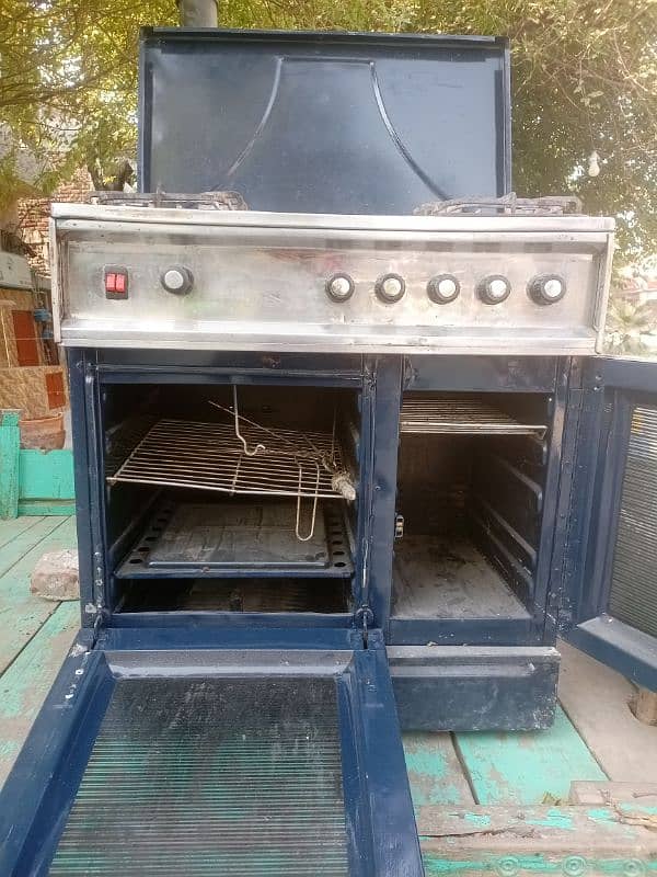 Slightly used Nasgas 5 burner cooking range oven for urgent sale 4