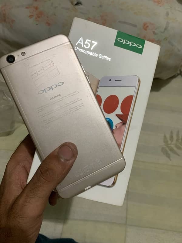 oppo A57 4 64 with box and charger 6