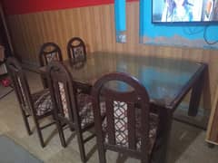 zbrdast offer big size table with 6 wooden chairs.