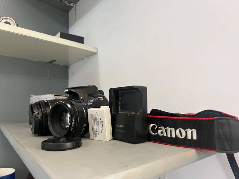 Canon 650d with 18-55 kit lens & 50mm Portrait lens 10