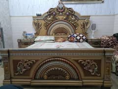 wood bed in good condition with mattreous and side tables. 0