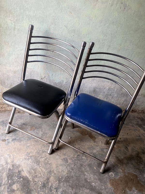 steel chairs and tables 0