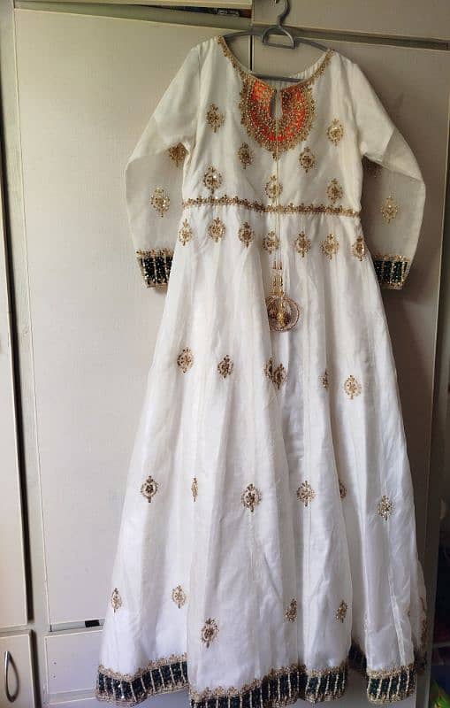 Party wear dress,Maxi with cancan attached,brand Khudabakhshcreations. 9