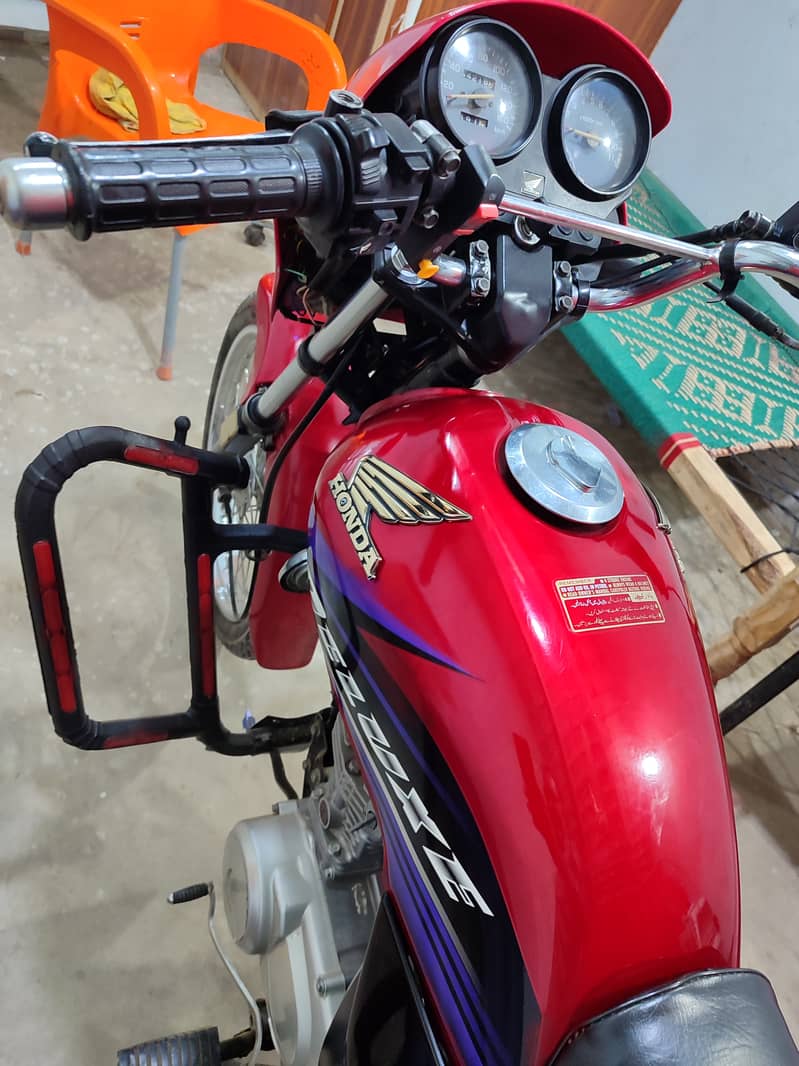 Need money. want to sale Honda 125 full fresh 2015. Mardan Register. 2